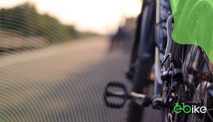 A folded bike in an urban setting, illustrating its compact and portable nature.