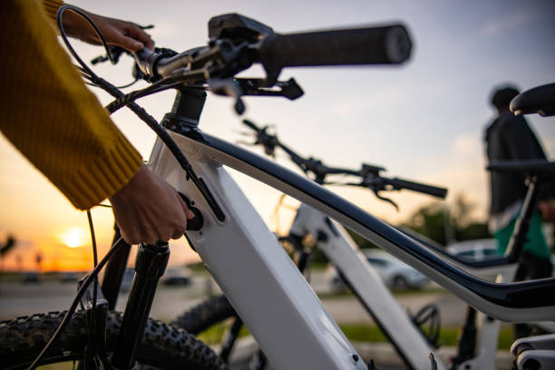 A person riding an eBike through a scenic park, showcasing the convenience and enjoyment of electric biking.